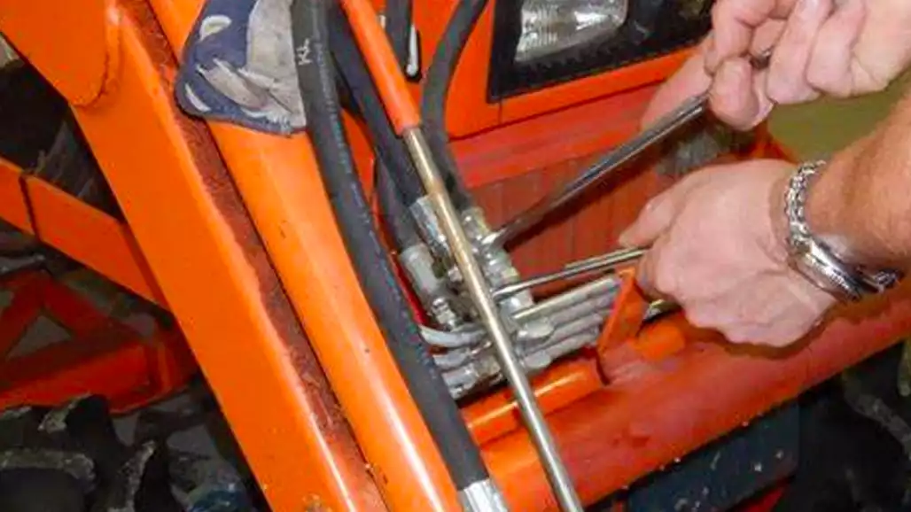 Hook Up Hydraulic Hoses on a Tractor