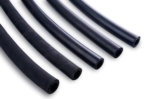 Hydraulic hoses with different outer materials