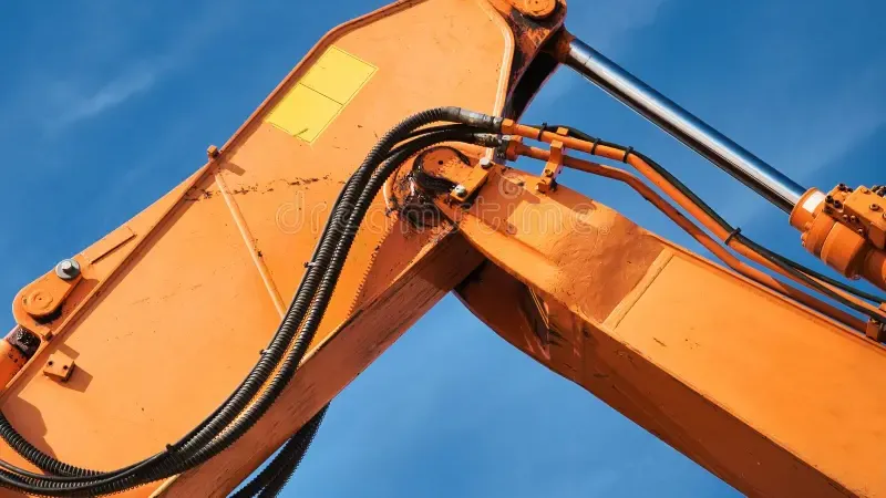 hydraulic hose routing on excavator boom